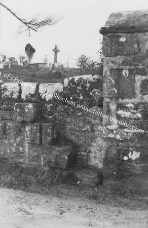 ABBEY ASSAROE CARVED REMNANTS BUILT INTO WALL